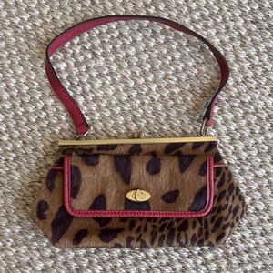 Chic Leopard Print Shoulder Bag with Red Trim